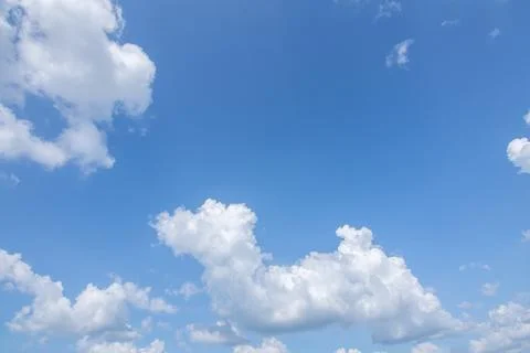 Sun, blue sky and clouds. Stock Photos