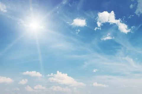 Sun on blue sky background Stock Photos