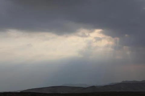 Sun in the blue sky with clouds. Brightly sunlight Stock Photos