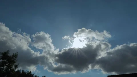 The Sun in the blue sky over clouds Stock Footage 145798460
