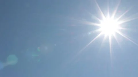 Sun in blue sky is passing the screen Video stock 54272999