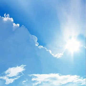 Sun in blue sky Stock Photos