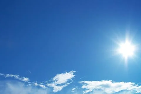 Sun in blue sky Фото