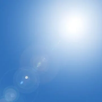 Sun in the blue sky Stock Photos