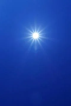 Sun in blue sky Stock Photos