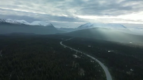 Sun breaking through clouds, drone shot Stock Footage 289576752