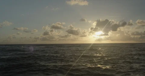 Sun breaking through clouds Stock Footage 86113643
