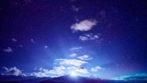 Sun Breaking Through Clouds at Twilight Stock Photos