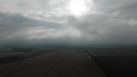 Sun Breaking Through Dramatic Clouds Over Ruegen Aerial View Stock Footage 346056744