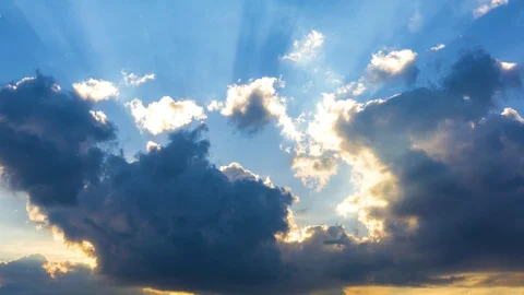 Sun breaking through dramatic cloudscape time lapse Stock Footage 89835800
