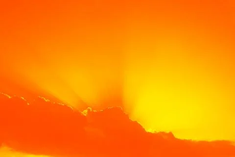 The sun breaking through white clouds. Stock Photos