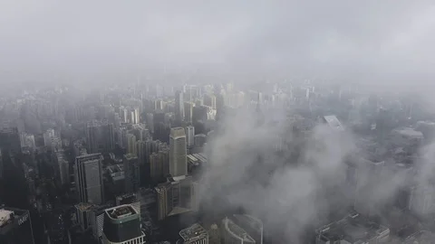 The sun breaks through the clouds and highlights the individual buildings. Stock Footage 113160651