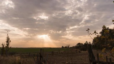 The sun breaks through the clouds Stock Photos