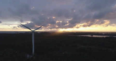 Sun Breaks Through Clouds, Wind Power Plant Video stock 86399599