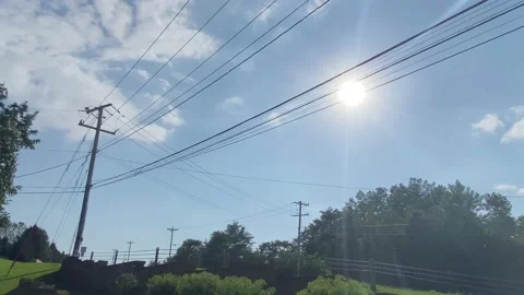 Sun - Bright Sun by Power Lines Stock Footage 201569395