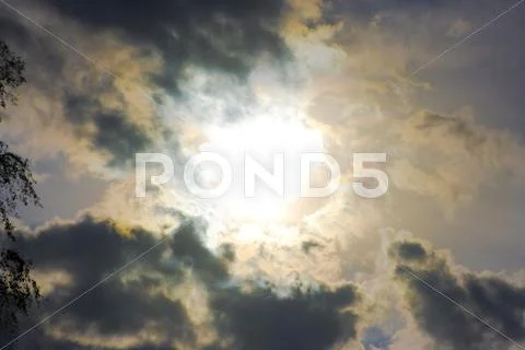 Sun broke through dramatic clouds. Stock Photos