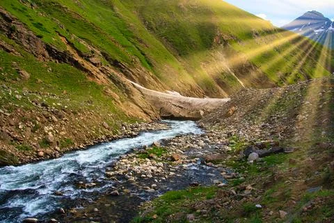 SUN BRUST ON WATER STREAM Stock Photos