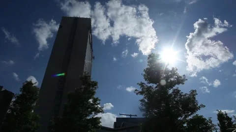 Sun, Building and Tree Stock Footage 1002037