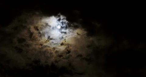 Sun burns through unstable layers of fragmented clouds as storm system develops. Video stock 281316835