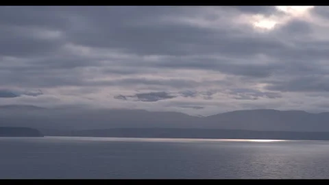 Sun burst over cloudy sea Stock Footage 296517772