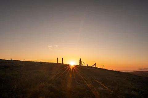 Sun Burst Through An Old Gate On Santa Rosa Island Stock Photos