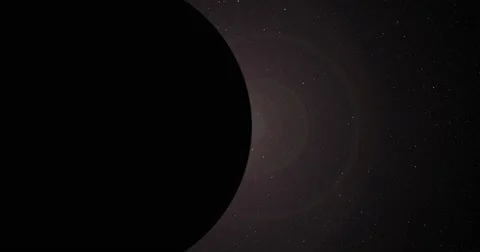 The sun bursts into view over Ceres' horizon and illuminates the surface.  Stock-Footage 64056378