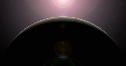 The sun bursts into view over Europa's horizon and illuminates the surface. Stock Footage 63799004