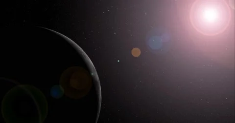 The sun bursts into view over the Moon's horizon and illuminates the surface. Stock Footage 64061359