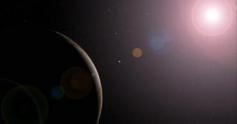 The sun bursts into view over Pluto's horizon and illuminates the surface. Stock Footage 63801907