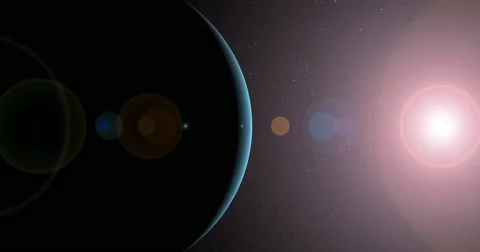 The sun bursts into view over Uranus' horizon and illuminates the surface. Video stock 63802645