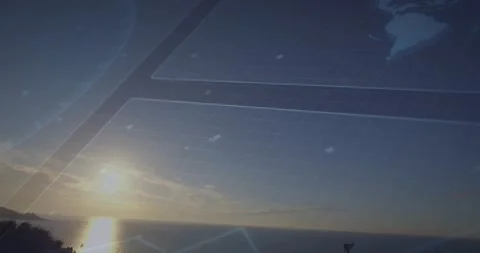 Sun casting warm reflection on ocean with dashboard grid overlay highlighting Stock Footage 328150850
