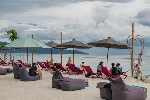 Sun chairs on beach, panoramic view Stock Photos