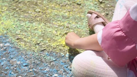 Sun child hand drawing chalk asphalt, child kid childhood dream, little artist Stock Footage 277562761