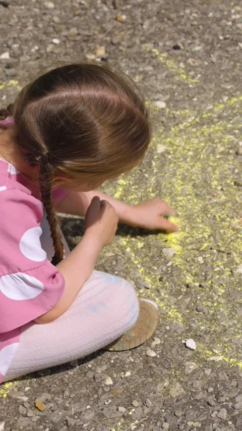 Sun child hand drawing chalk asphalt, child kid childhood dream, little artist Stock Footage 300461425