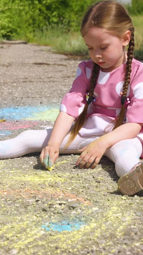 Sun child hand drawing chalk asphalt, child kid childhood dream, little artist Stock Footage 301695882