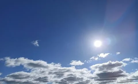 Sun in a clear blue sky for background Stock Photos