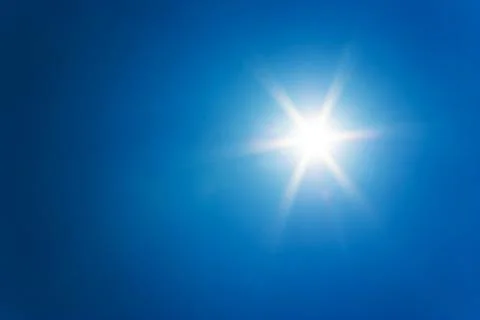 Sun at clear blue sky Stock Photos