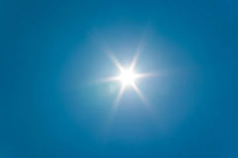 Sun at clear blue sky Stock Photos