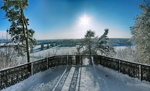 The sun in the clear winter sky at sunset Stock Photos