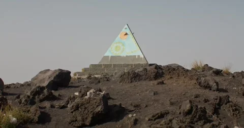 Sun clock among the rocks at the foothills of Etna volcano, travel Sicily, 4k Video stock 332713945