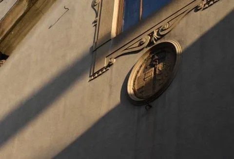 The sun clock shows nicely on the wall in Florence Italy Фото
