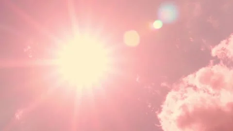 Sun Close-up in Clear Pink Dawn Sky and White Pink Puffy Cloud Time Lapse, Sunri Stock Footage 250097781