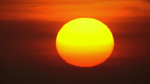 Sun close-up on the horizon. Huge warm sun disc. Stock Footage 99059572