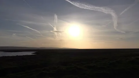 Sun cloud lapse over marshlands Stock Footage 62817171