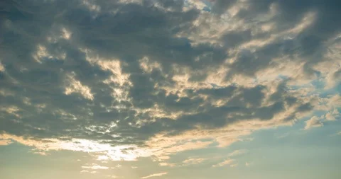 The sun in the clouds 4K 動画素材 115239607