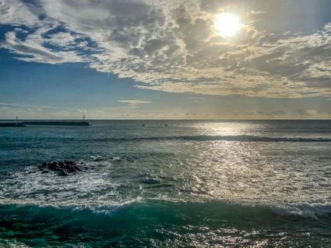Sun with clouds arranged in pattern mauritius Stock Photos