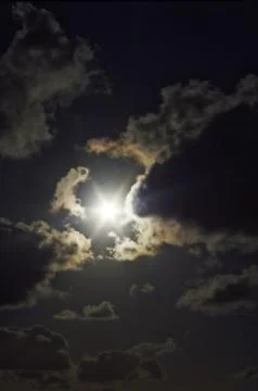 Sun with clouds Stock Photos