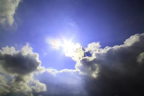 Sun with clouds Stock Photos