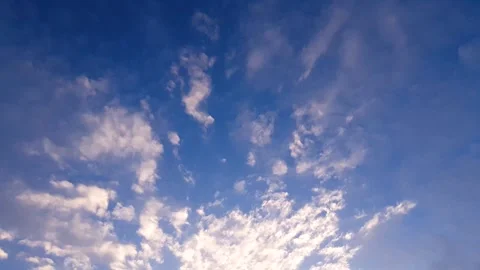 The sun clouds in the sky. Cloudy evening landscape. Sunbeams shining through Stock Footage 345516834