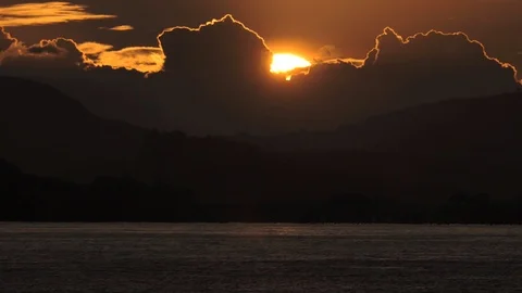 Sun in the clouds at sunset Stock Footage 96584825